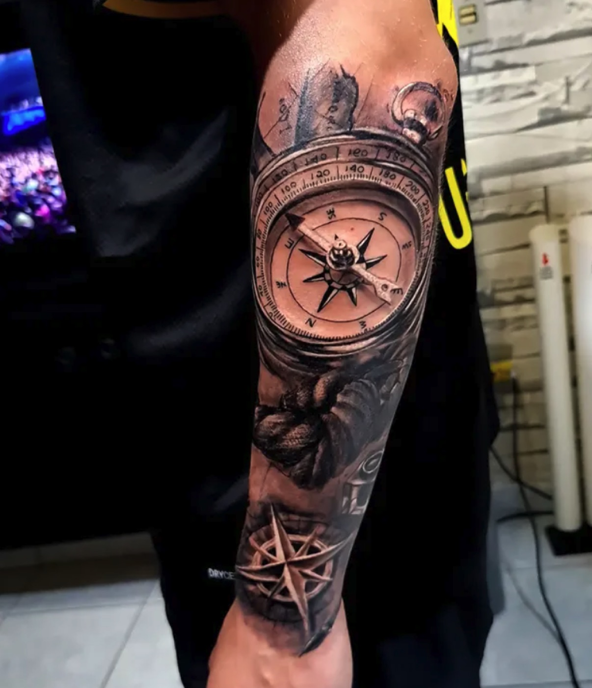 Black and grey realism compass tattoo