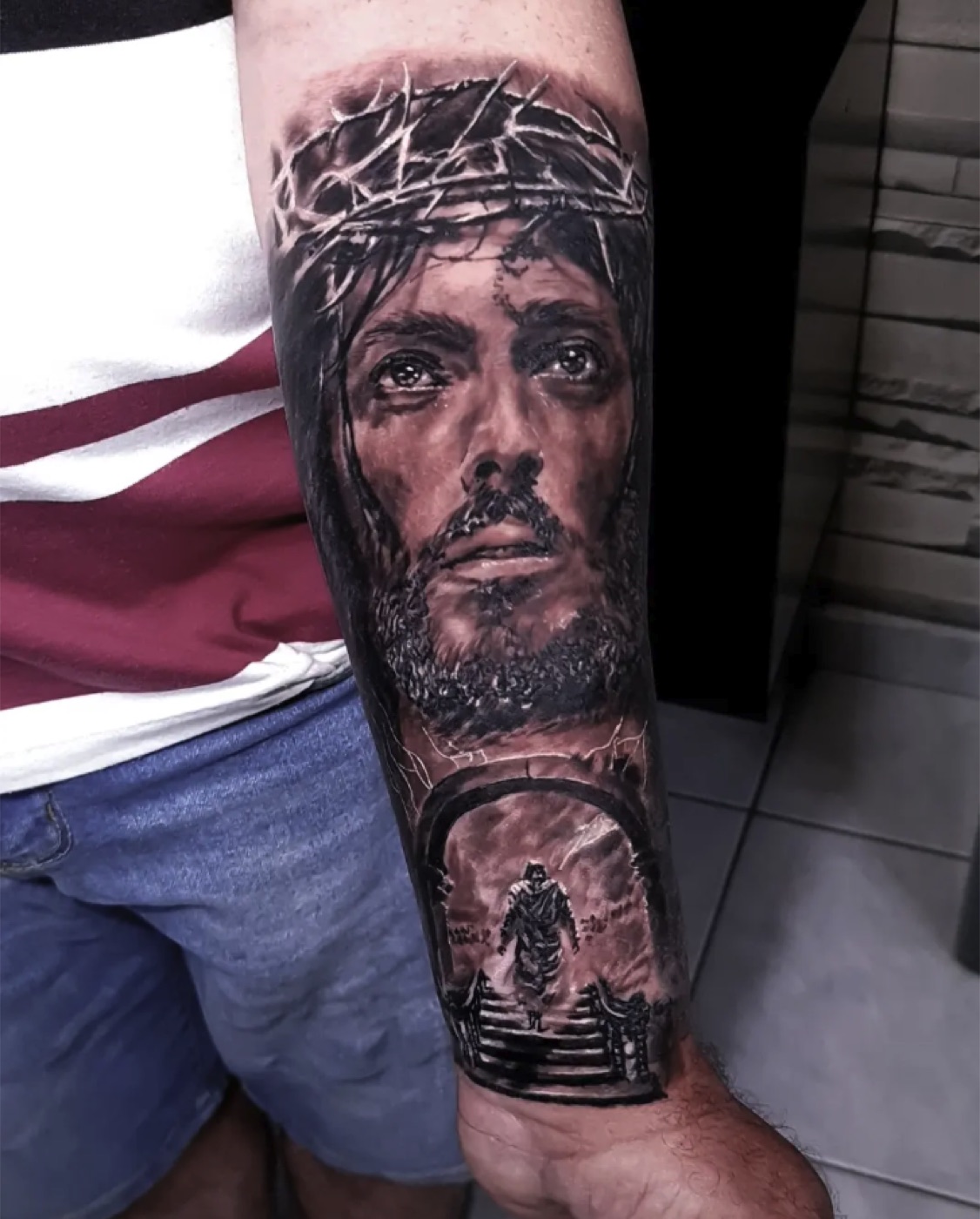 Black and grey religious realism tattoo