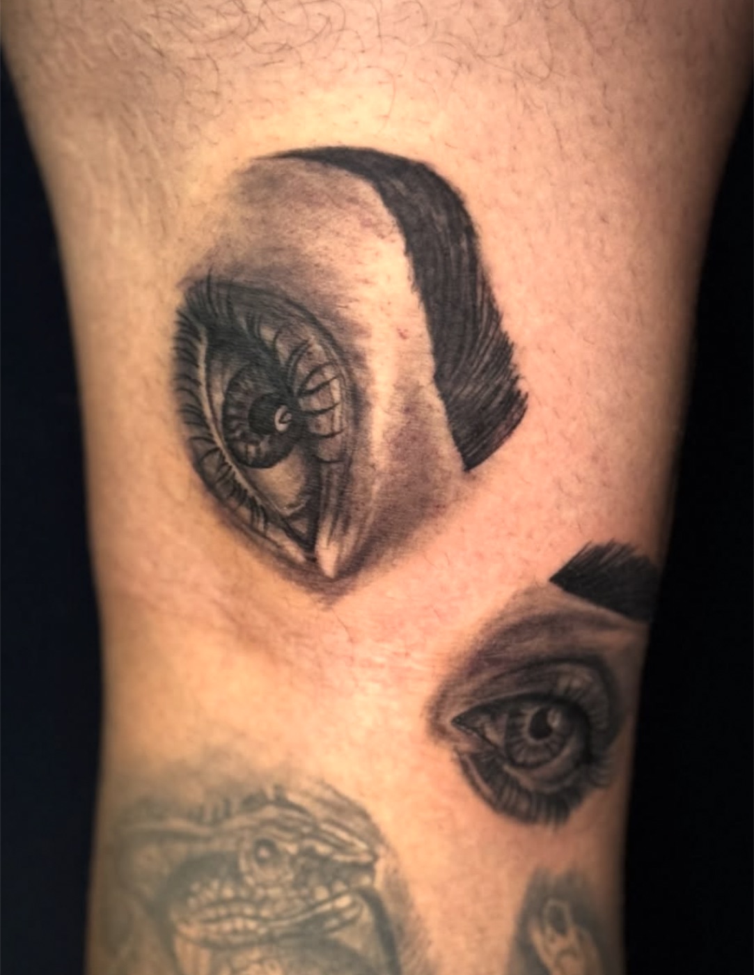 Black and grey barn owl and eye realism tattoo