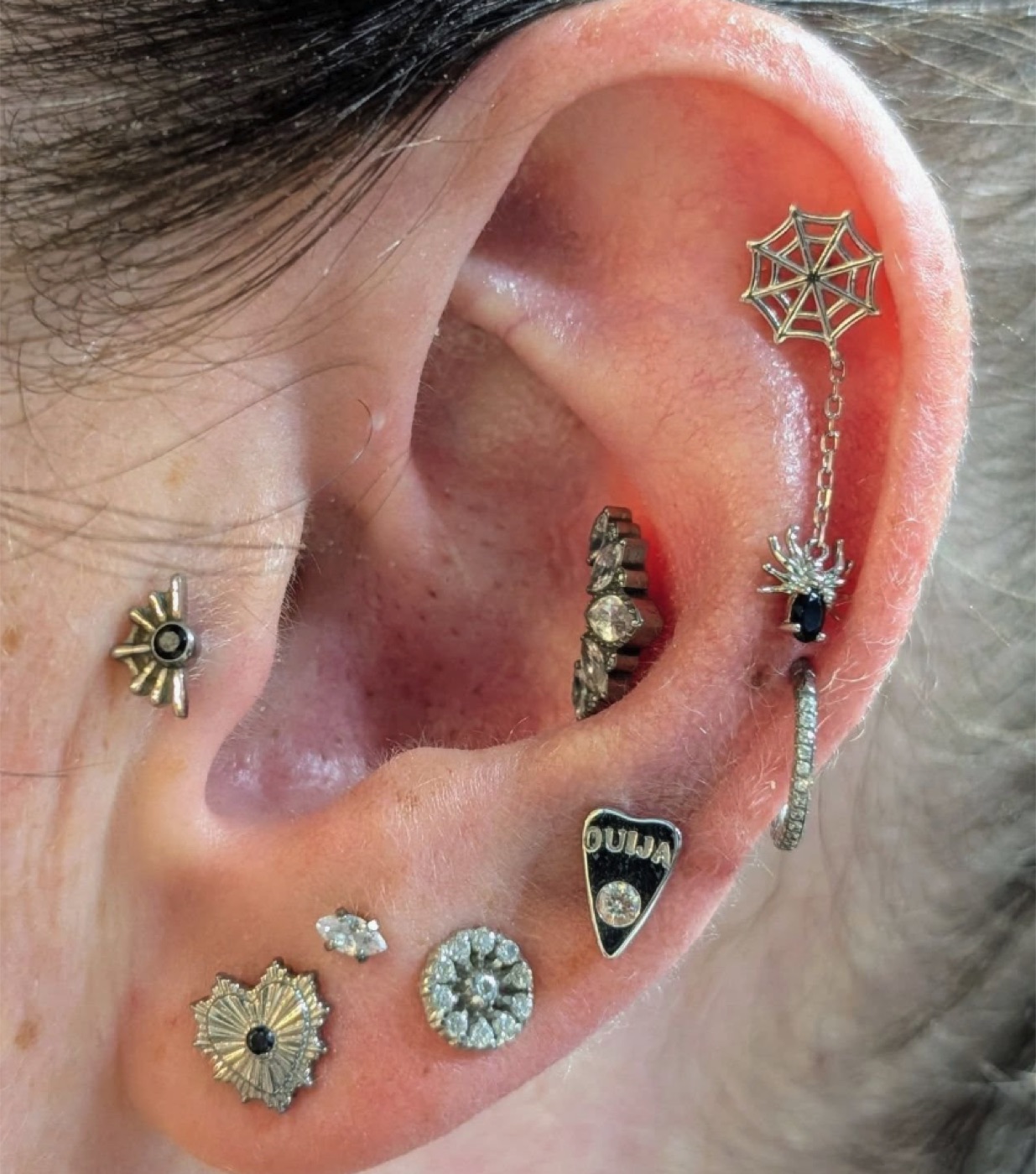 Curated ear piercing arrangement