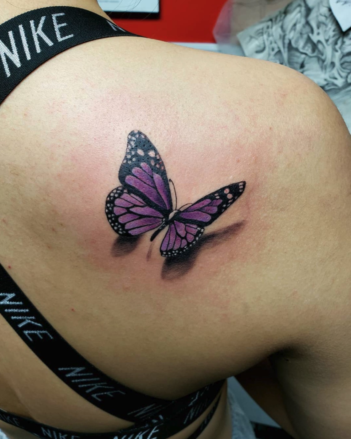 3D purple butterfly tattoo